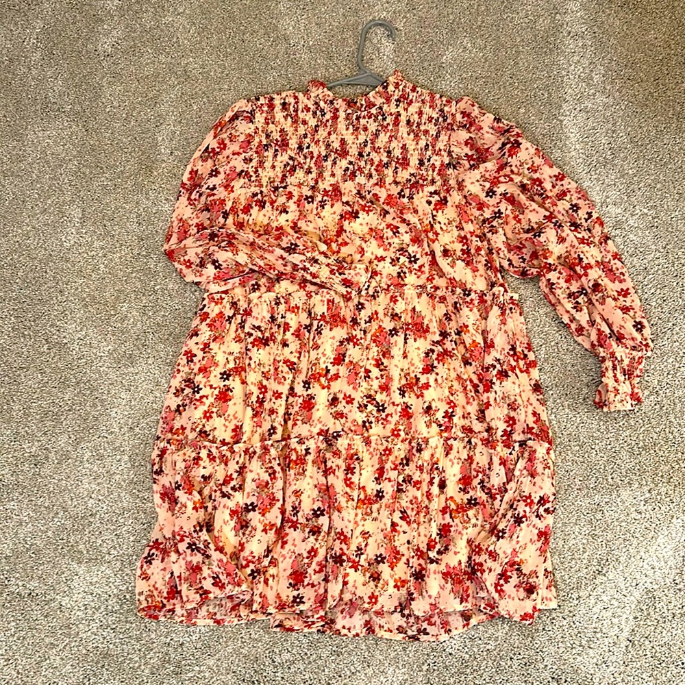 Cute soft pink floral dress with smocking by Entro